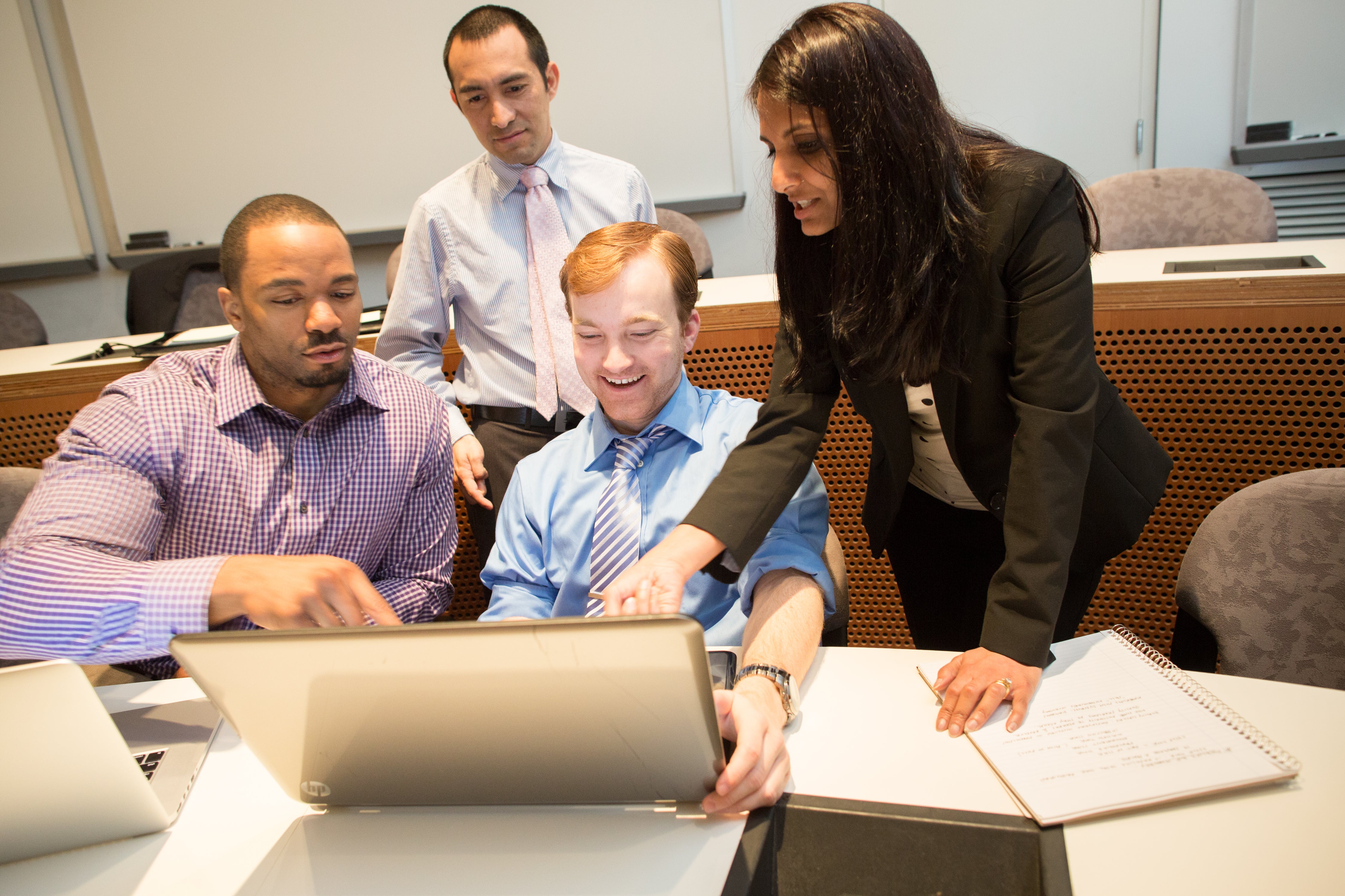 students reviewing information on a computer